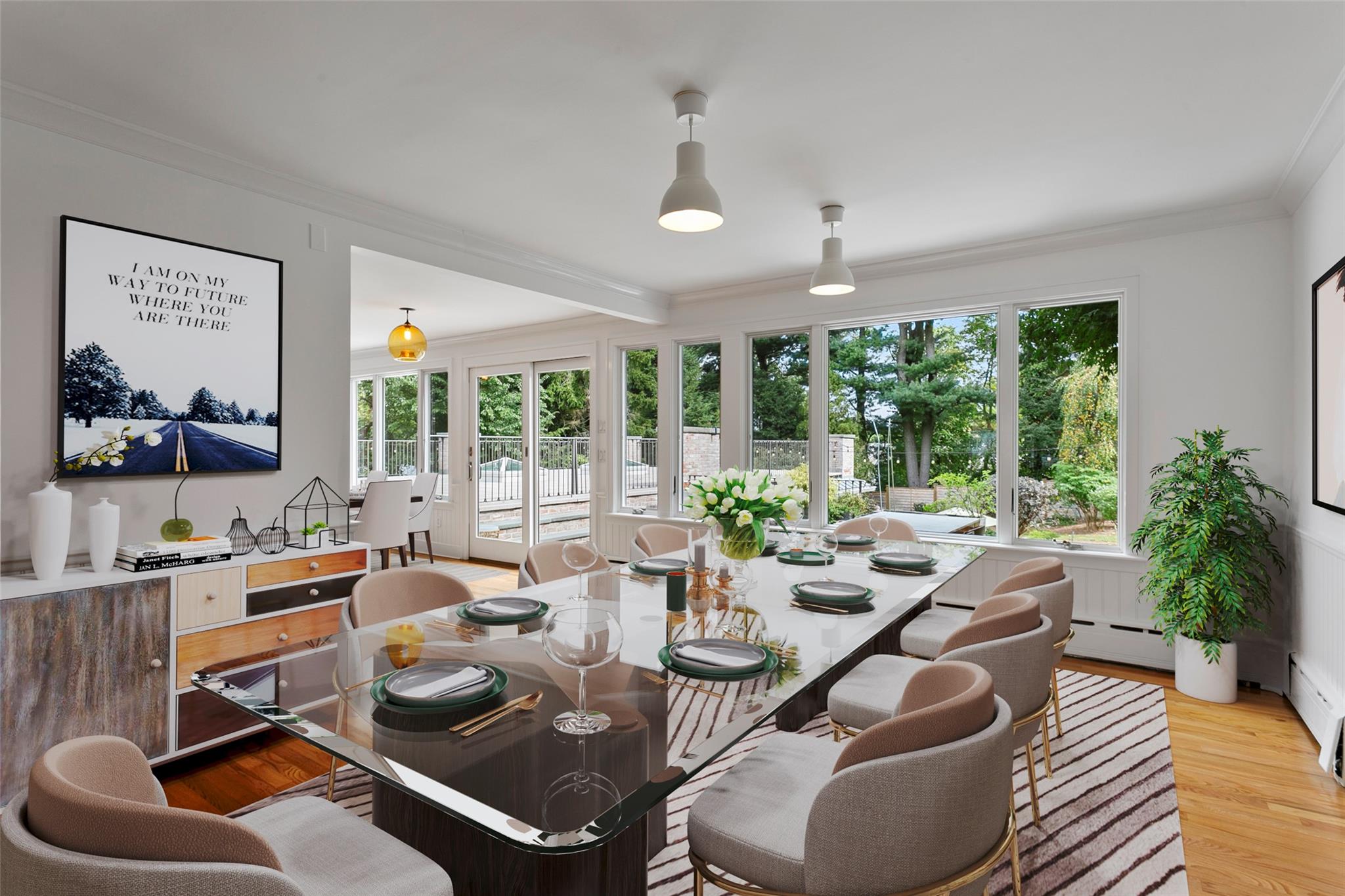 177 Clinton Avenue Dobbs Ferry, NY 10522 - Photo 4 of 29 a room with furniture lots of windows and wooden floor