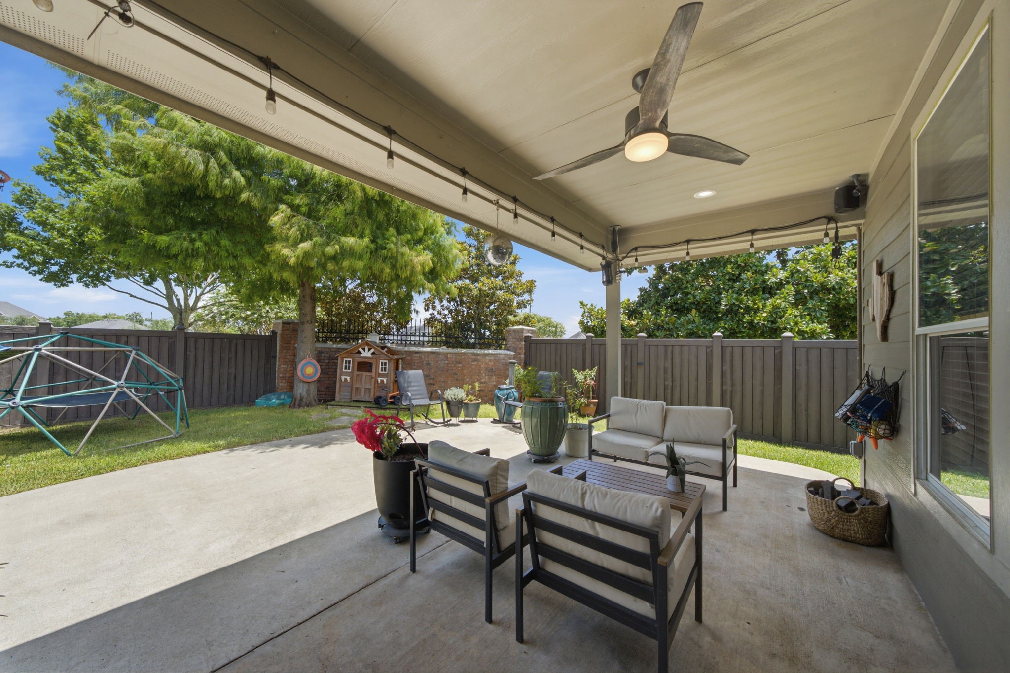 8911 Henrico Lane Rosenberg, TX 77469 - Photo 29 of 45 a outdoor living space with furniture and a slide