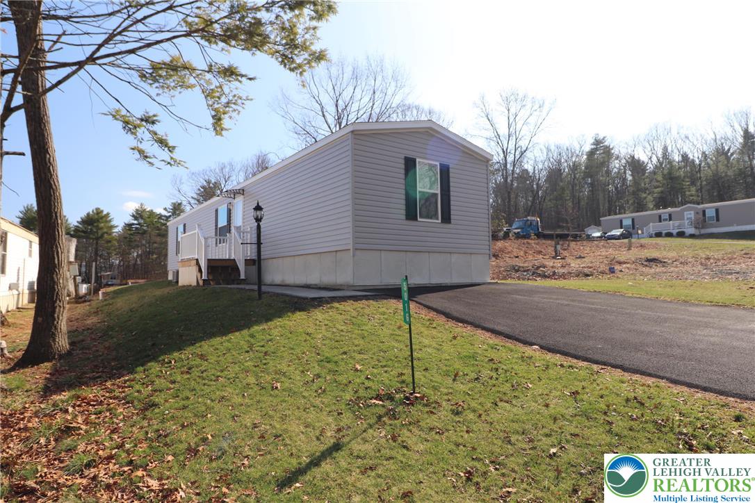 5016 Old Timber Road Stroudsburg, PA 18360 - Photo 1 of 34 a view of a backyard of the house