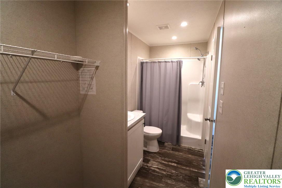 5016 Old Timber Road Stroudsburg, PA 18360 - Photo 18 of 34 a bathroom with a shower and a toilet