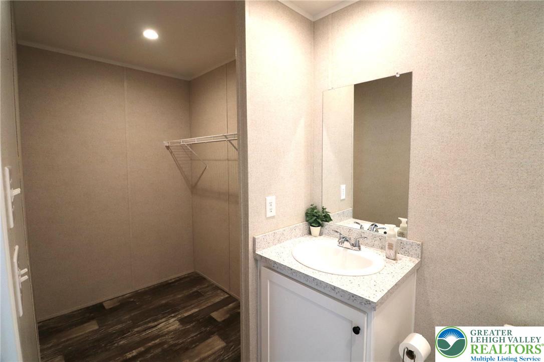 5016 Old Timber Road Stroudsburg, PA 18360 - Photo 20 of 34 a bathroom with a sink and a mirror