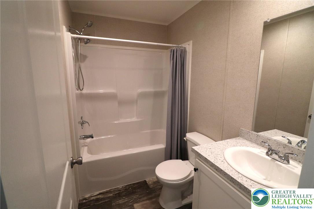 5016 Old Timber Road Stroudsburg, PA 18360 - Photo 24 of 34 a bathroom with a sink toilet and shower