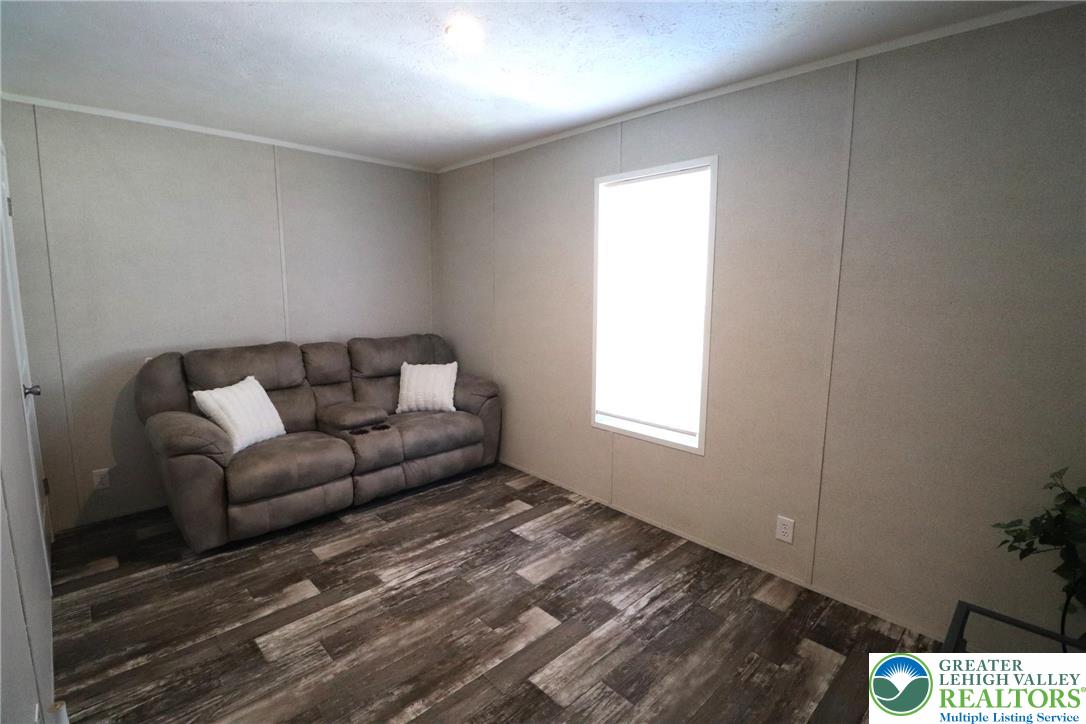 5016 Old Timber Road Stroudsburg, PA 18360 - Photo 26 of 34 a living room with furniture and a window