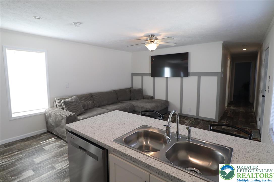 5016 Old Timber Road Stroudsburg, PA 18360 - Photo 10 of 34 a kitchen with a sink cabinets and window