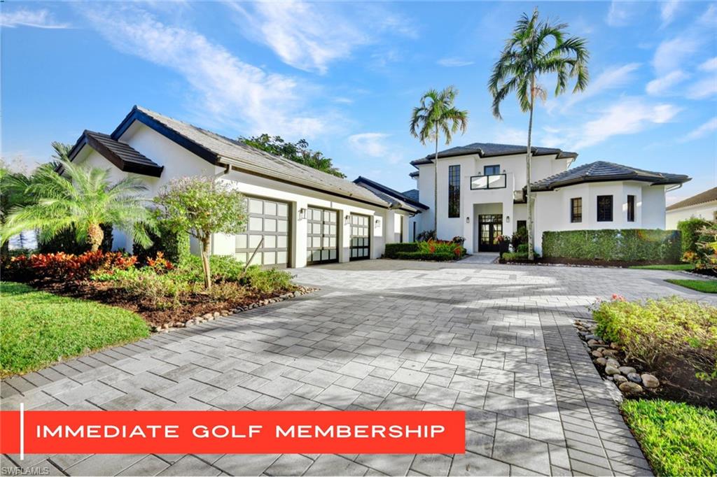 16988 Fairgrove Way Naples, FL 34110 - Photo 1 of 34 a view of a house with a street