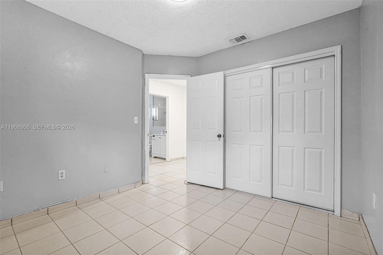 3289 West 70th Street Hialeah, FL 33018 - Photo 26 of 50 a view of an empty room and window