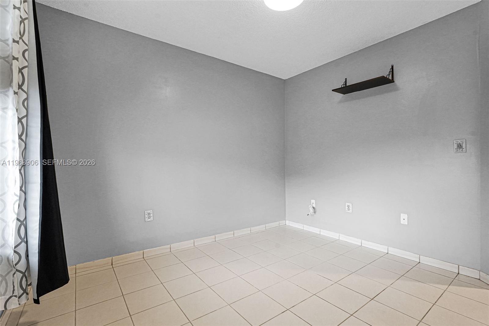 3289 West 70th Street Hialeah, FL 33018 - Photo 30 of 50 a view of an empty room