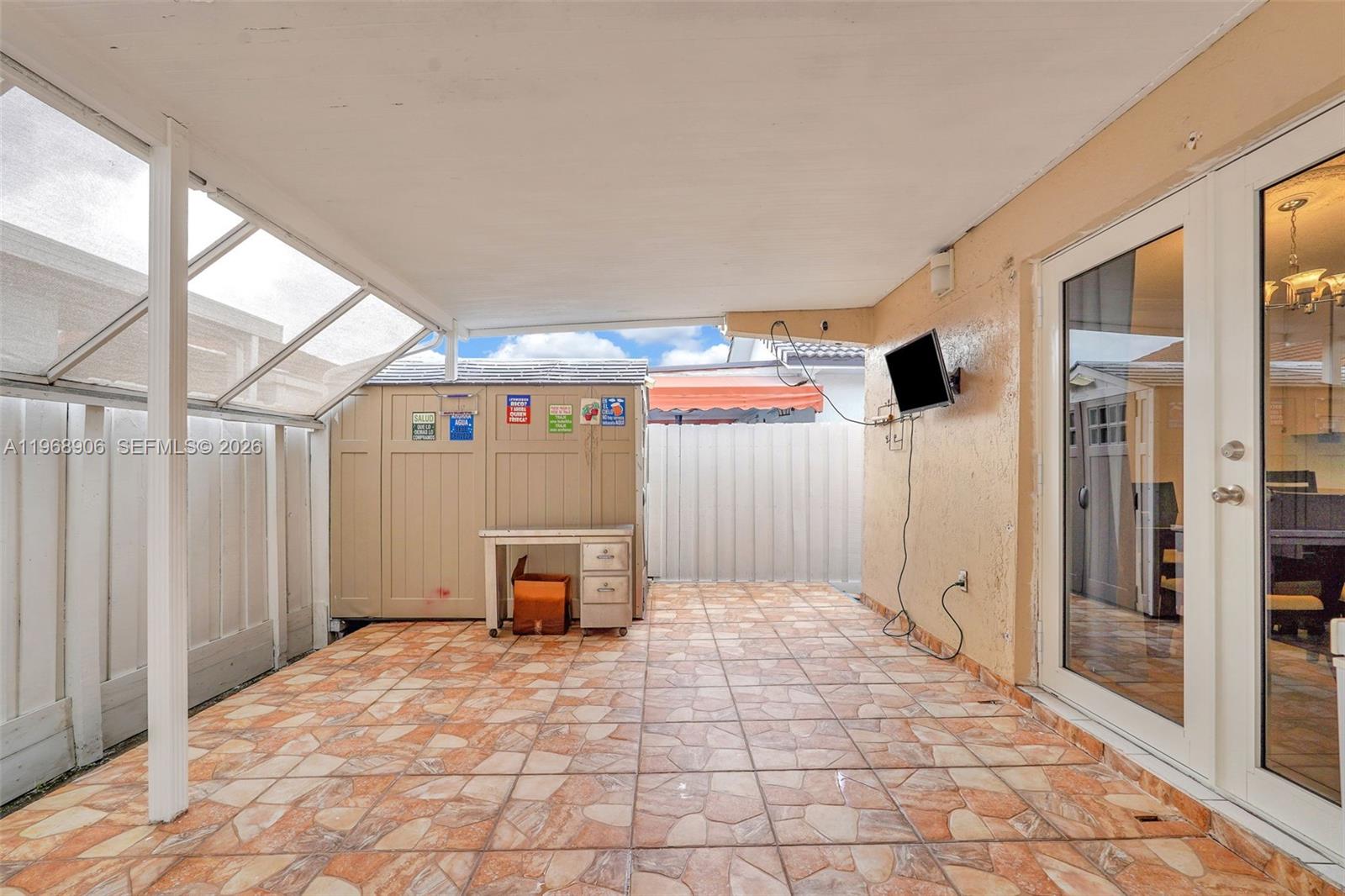 3289 West 70th Street Hialeah, FL 33018 - Photo 37 of 50 a room with a bed and a table