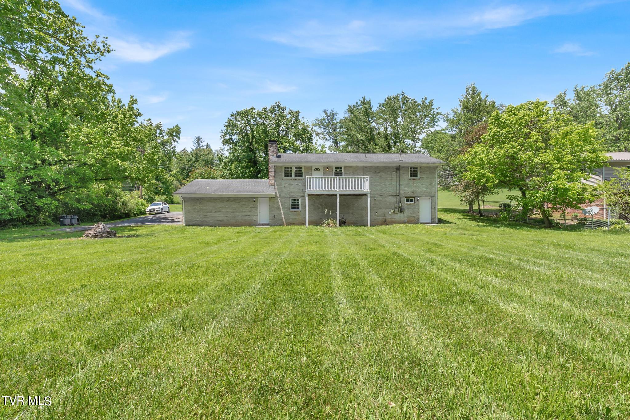 419 Cedar Valley Road Bristol, TN 37620 - Photo 54 of 54 Spacious Level Backyard