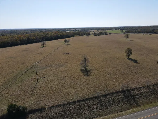 a view of lake with a mountain in the background