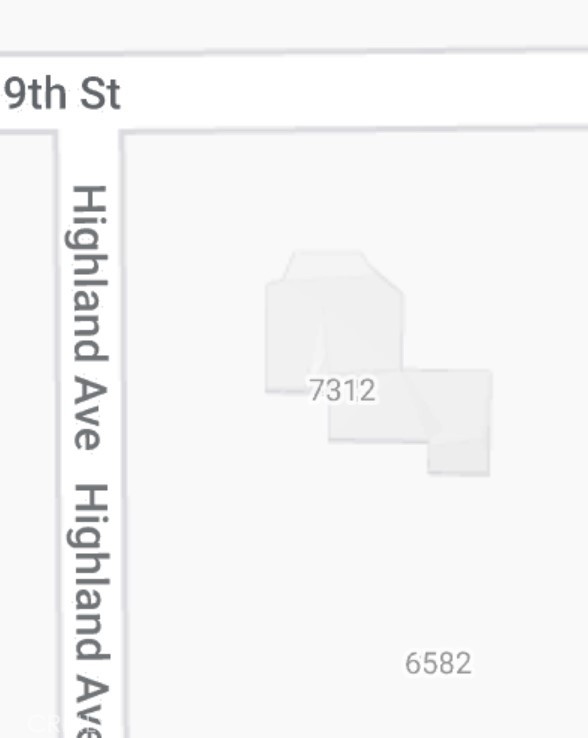 7312 9th Street Buena Park, CA 90621 - Photo 4 of 5 a picture of a wall with a white wall and a large window