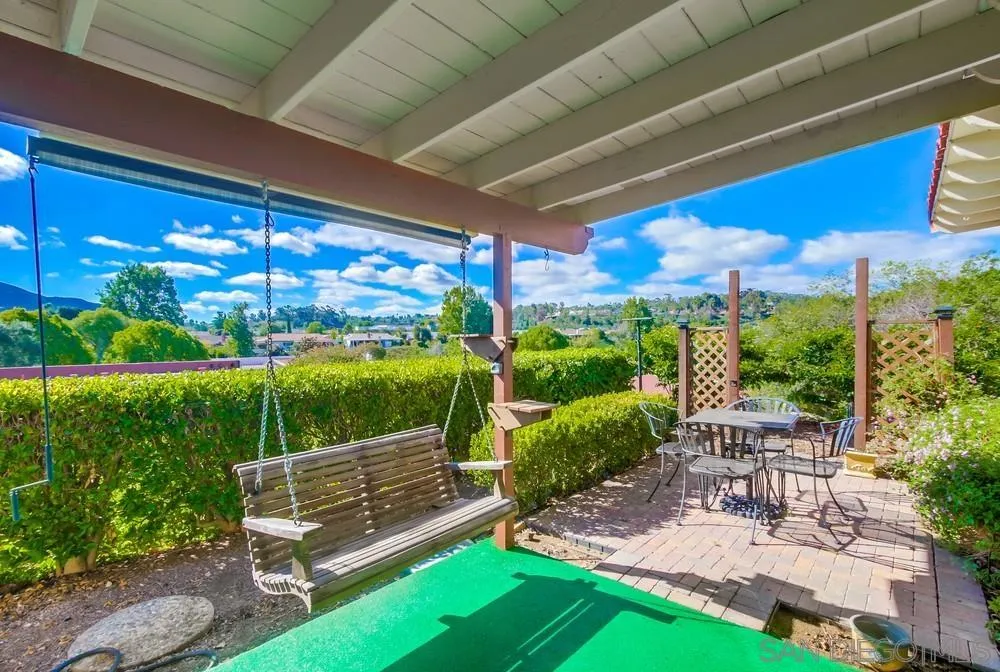 16632 Roca Drive San Diego, CA 92128 - Photo 3 of 44 a view of a chairs and tables in the backyard
