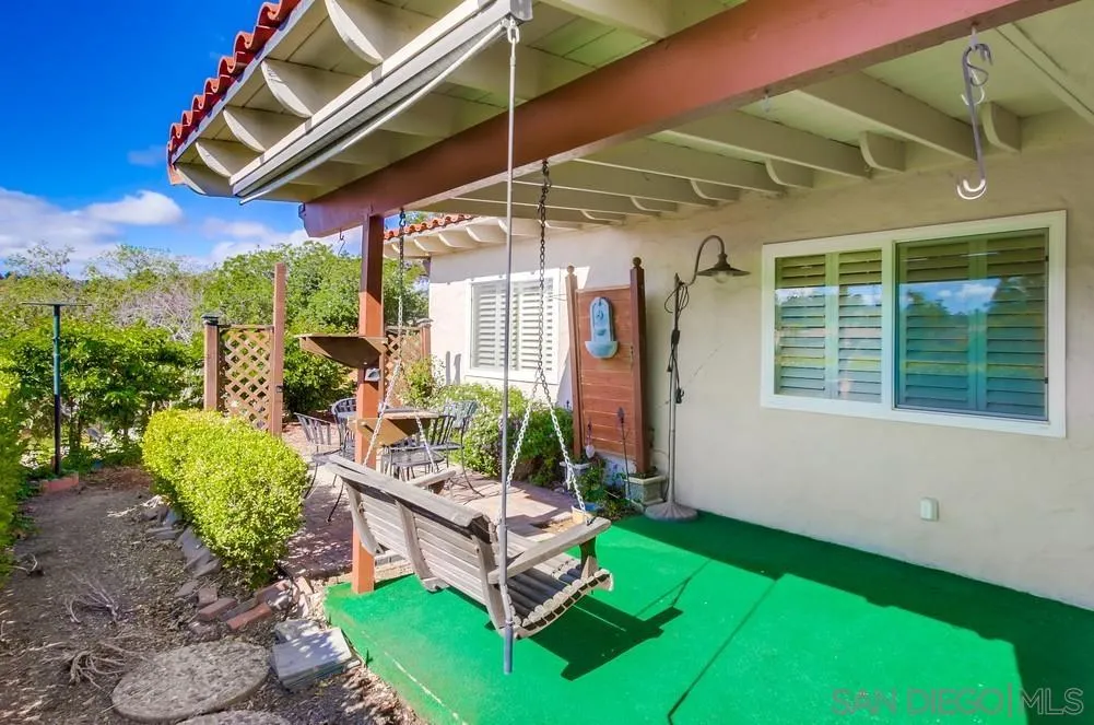 16632 Roca Drive San Diego, CA 92128 - Photo 32 of 44 a view of a backyard with a patio