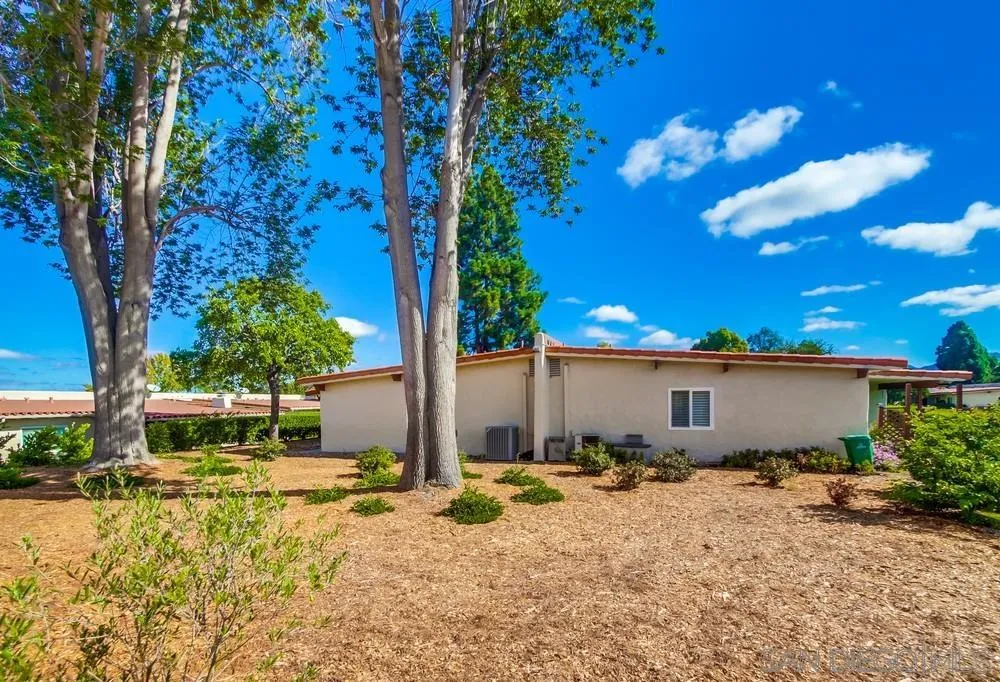 16632 Roca Drive San Diego, CA 92128 - Photo 35 of 44 a view of a house with a backyard