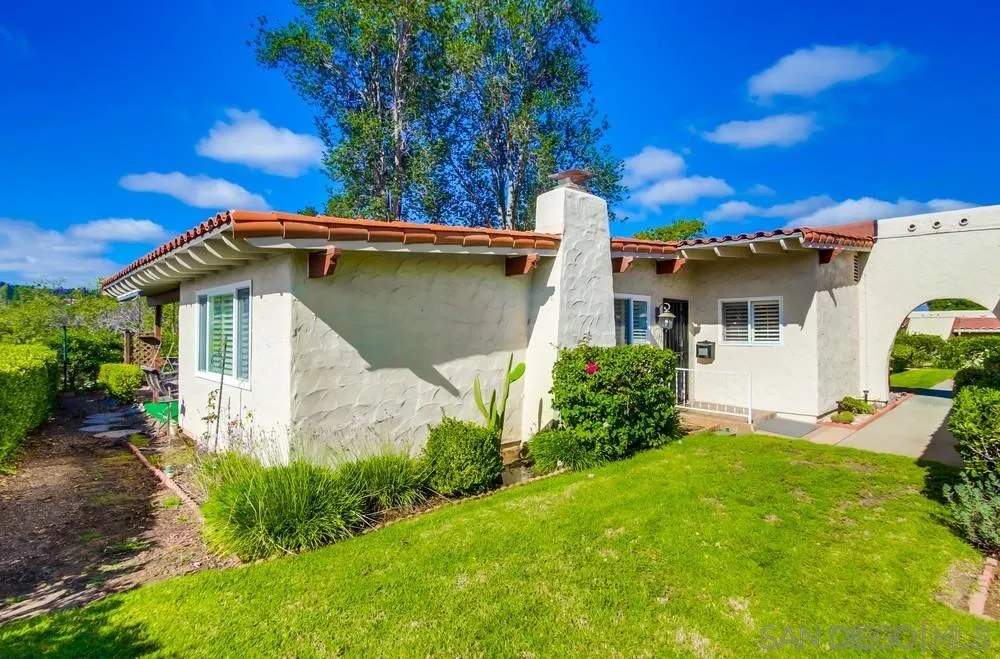 16632 Roca Drive San Diego, CA 92128 - Photo 4 of 44 a view of a house with a yard