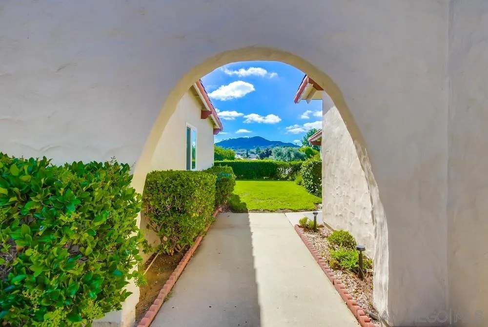 16632 Roca Drive San Diego, CA 92128 - Photo 41 of 44 a view of a pathway in a house along with garden
