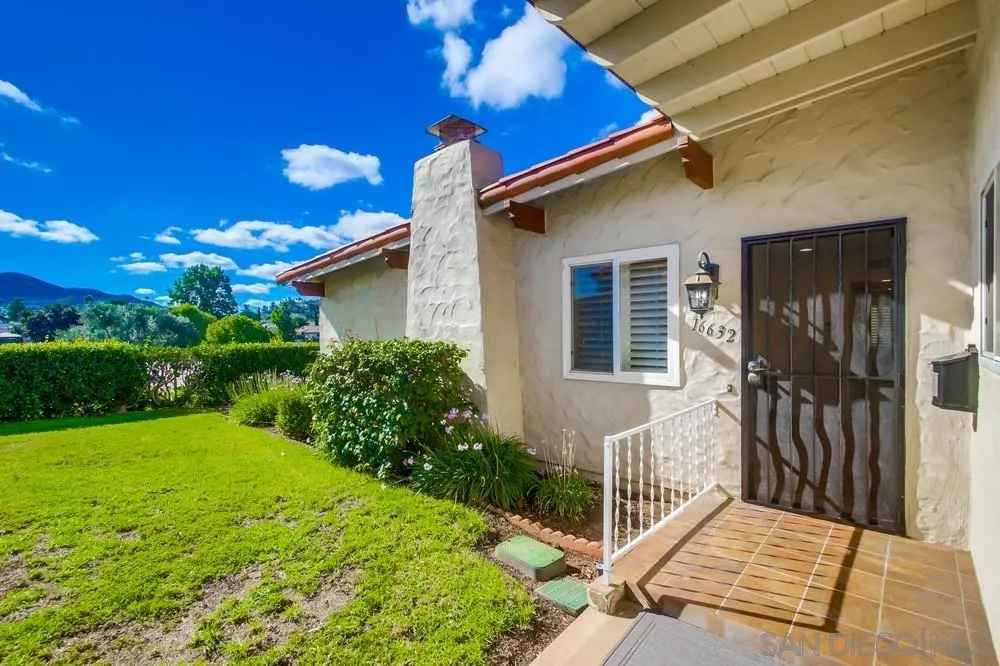 16632 Roca Drive San Diego, CA 92128 - Photo 5 of 44 a front view of a house with garden
