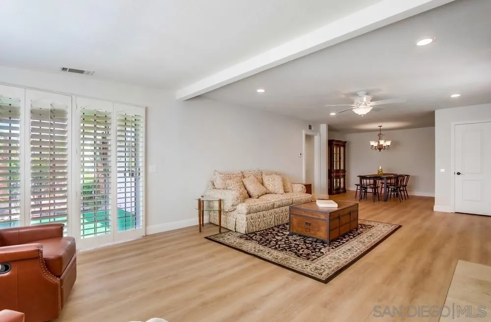 16632 Roca Drive San Diego, CA 92128 - Photo 9 of 44 a living room with furniture and a large window