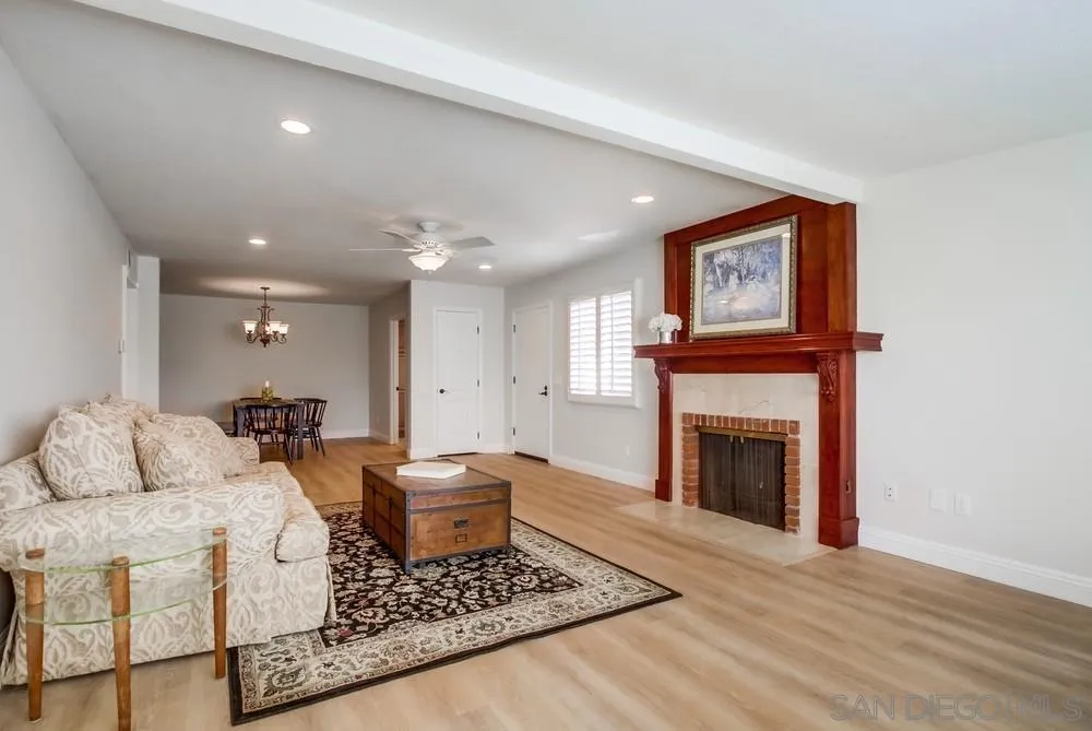 16632 Roca Drive San Diego, CA 92128 - Photo 10 of 44 a living room with furniture and a fireplace