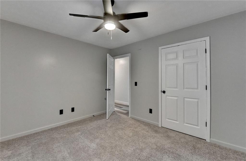 801 Davis Street Monroe, GA 30655 - Photo 30 of 33 wooden floor in an empty room