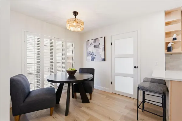 a view of a livingroom with furniture and window