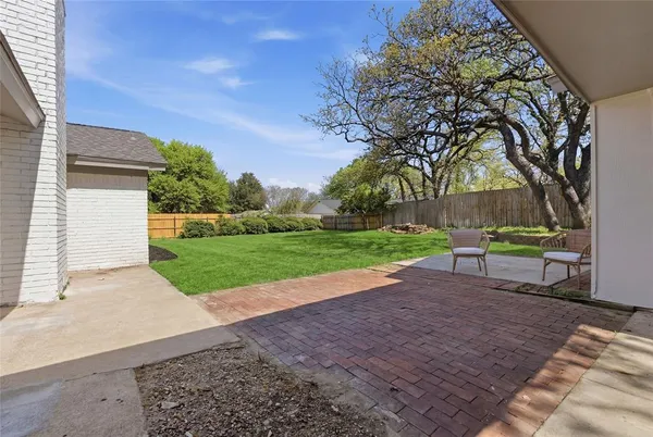 a view of backyard with green space