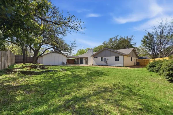 a house view with a garden space