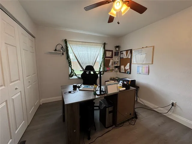 a view of a workspace with furniture