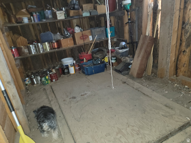 10429 4th Street East Randlett, UT 84063 - Photo 16 of 19 Interior of shed with trapdoor to root cellar or shelter