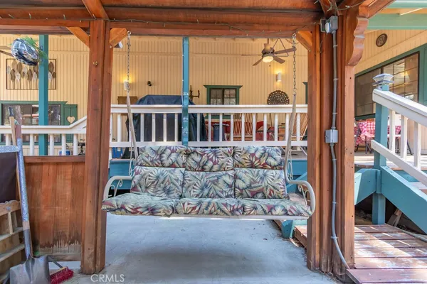a view of a lush green hillside and a houses