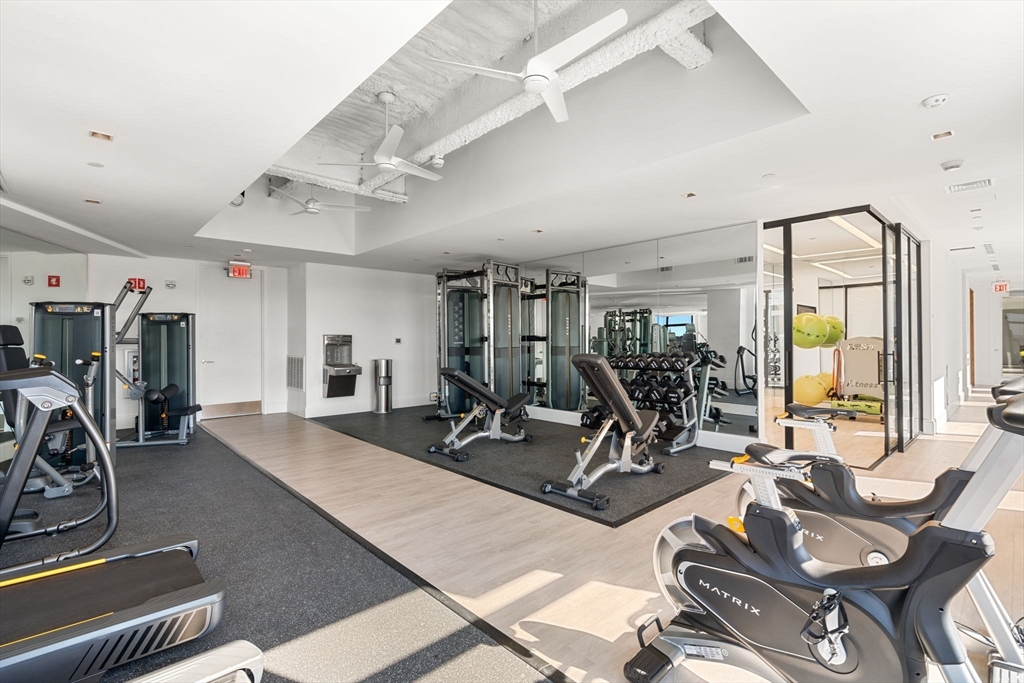 191 Washington Street, Unit 710 Boston, MA 02135 - Photo 27 of 35 a view of a room with gym equipment