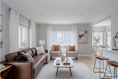 a living room with furniture and a couch
