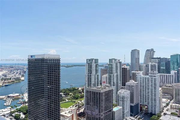 a view of a city with tall buildings