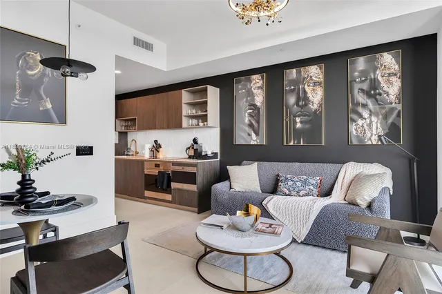 a living room with furniture and windows