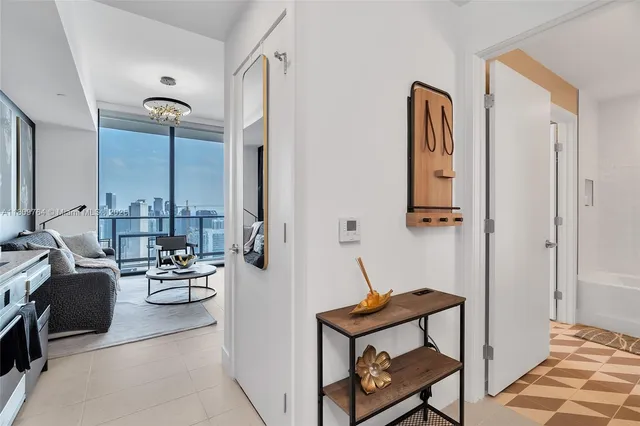 a kitchen with stainless steel appliances granite countertop a sink and a stove