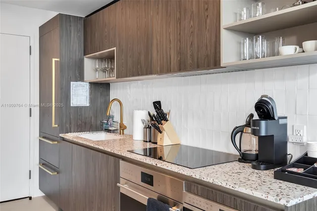 a living room with furniture fireplace and flat screen tv