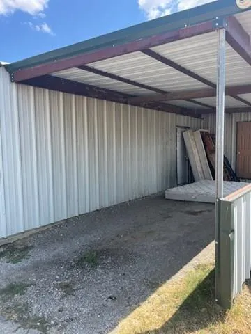 a view of a house with a street