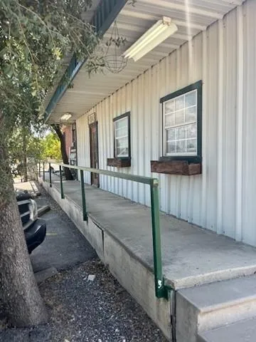 a view of a house with a street