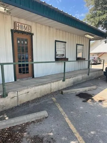 a view of outdoor space and wooden door