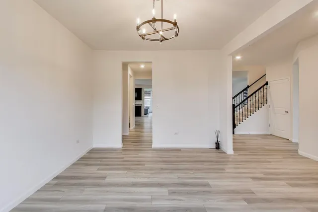 a view of entryway with wooden floor