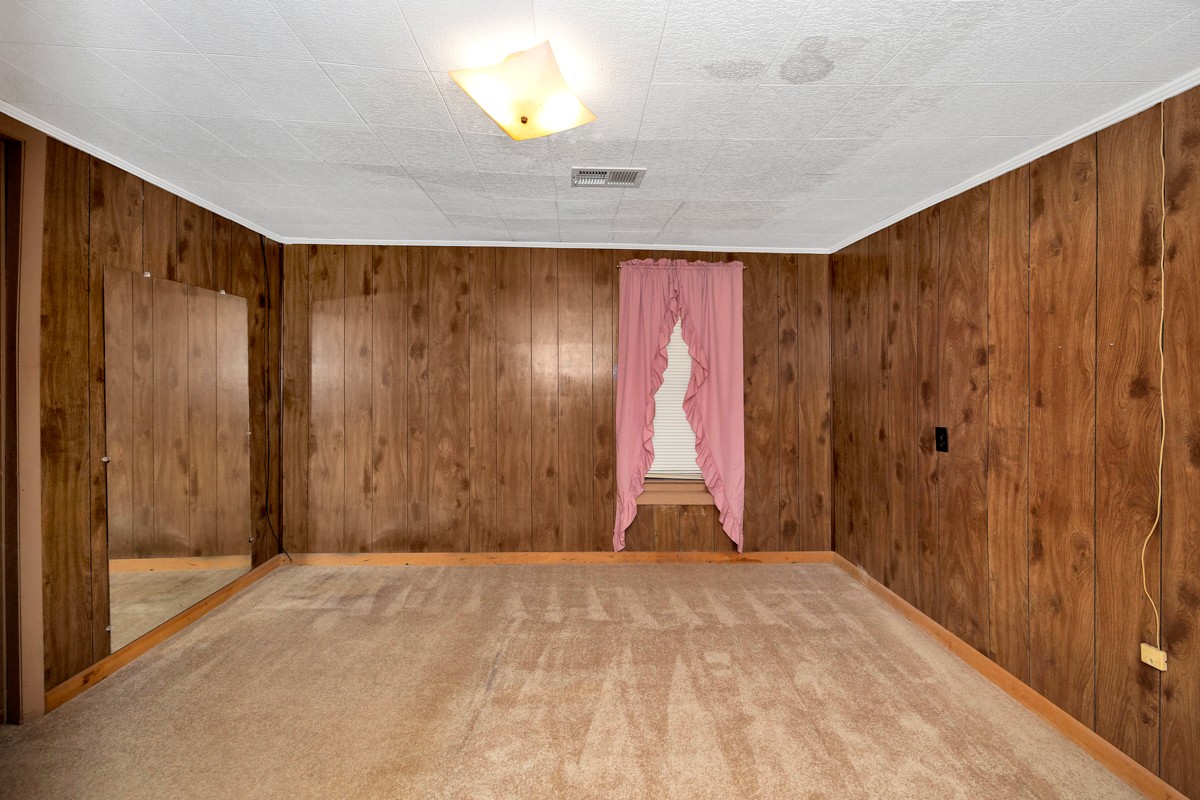 1121 Rolin Hollow Road Ardmore, TN 38449 - Photo 14 of 46 a view of a room with a wooden door