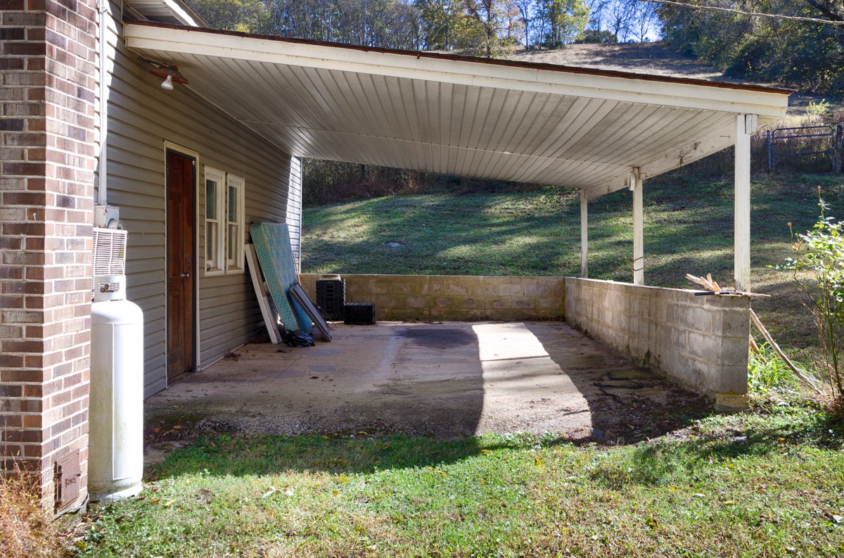 1121 Rolin Hollow Road Ardmore, TN 38449 - Photo 25 of 46 a view of a backyard with furniture
