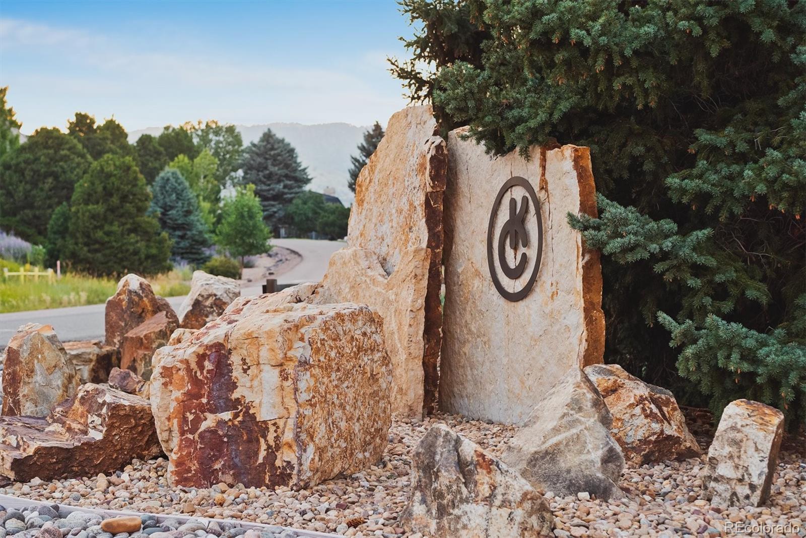 4 Mule Deer Trail Littleton, CO 80127 - Photo 36 of 40 a backyard of a house with lots of green space