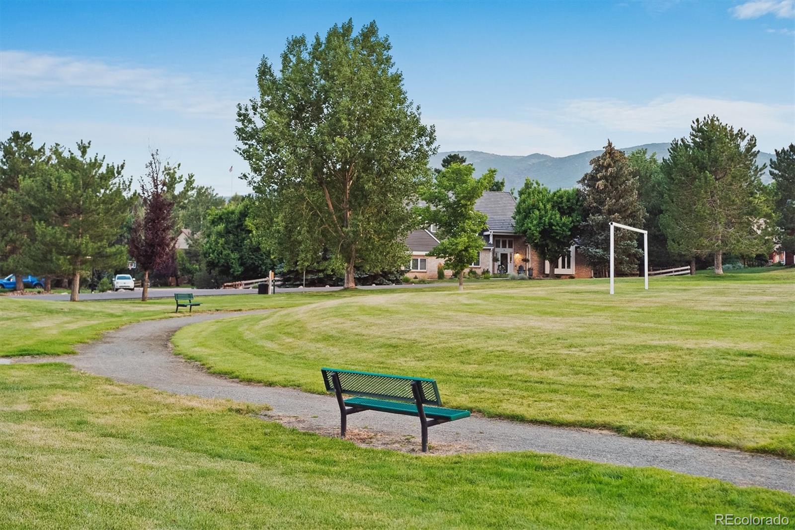 4 Mule Deer Trail Littleton, CO 80127 - Photo 38 of 40 a garden with trees
