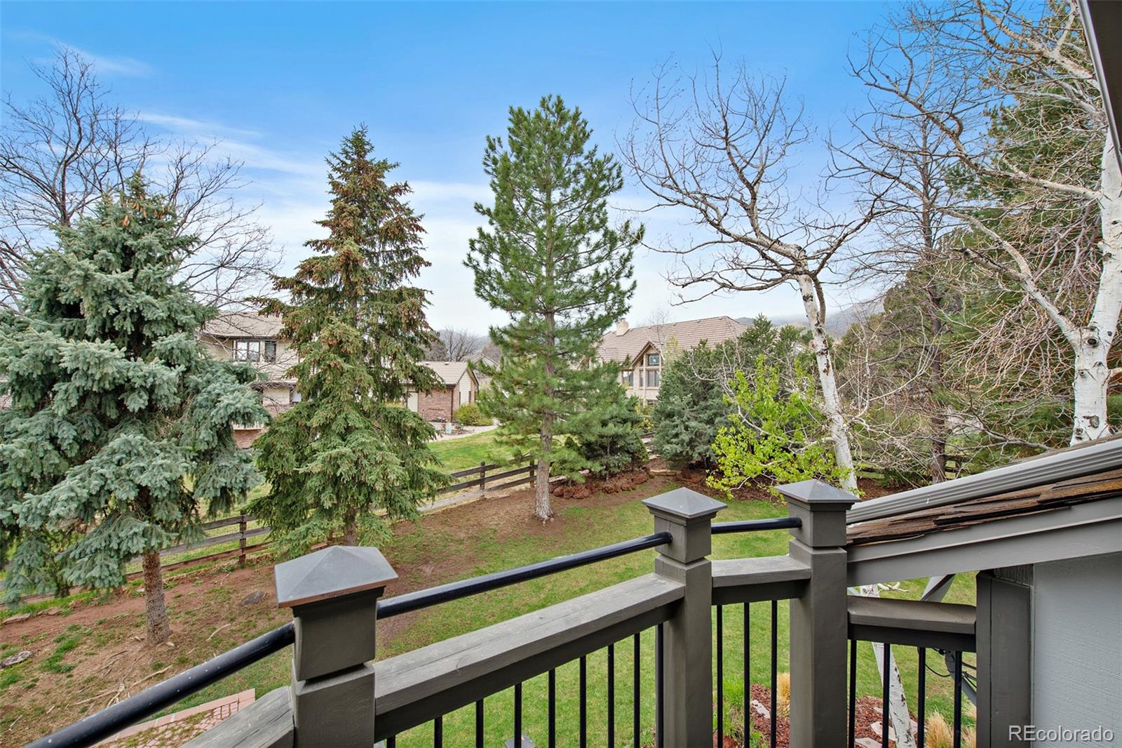 4 Mule Deer Trail Littleton, CO 80127 - Photo 40 of 40 a view of a balcony with chairs