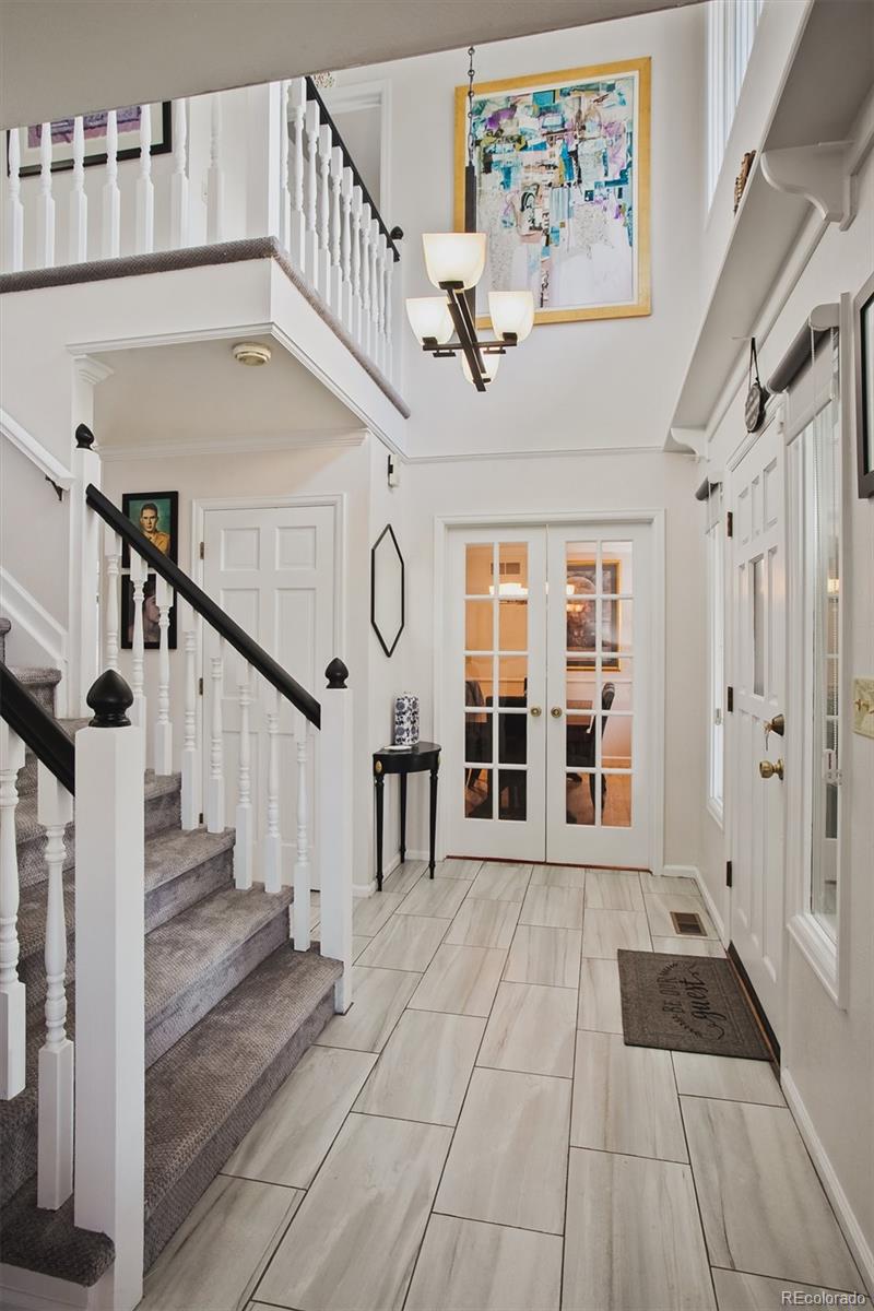 4 Mule Deer Trail Littleton, CO 80127 - Photo 5 of 40 a view of entryway with a front door