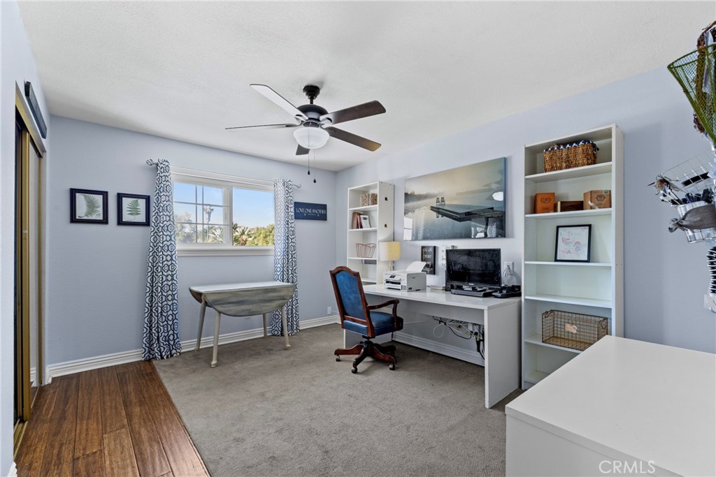 1446 Los Conejos Road Fallbrook, CA 92028 - Photo 25 of 66 a view of a workspace with furniture and a window