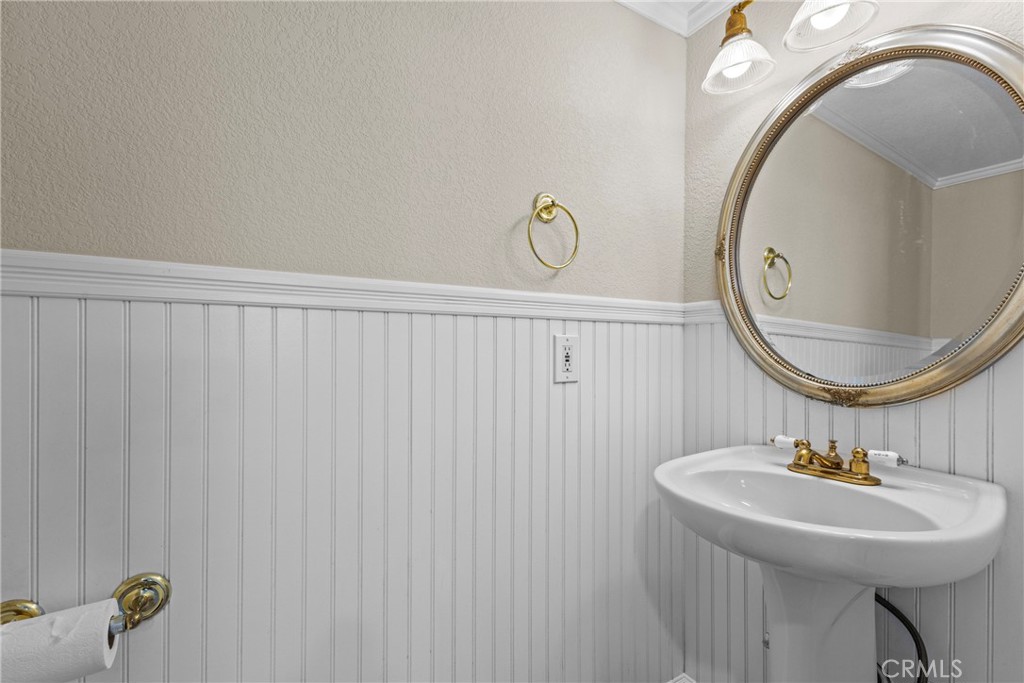 1446 Los Conejos Road Fallbrook, CA 92028 - Photo 30 of 66 a bathroom with a sink and a mirror