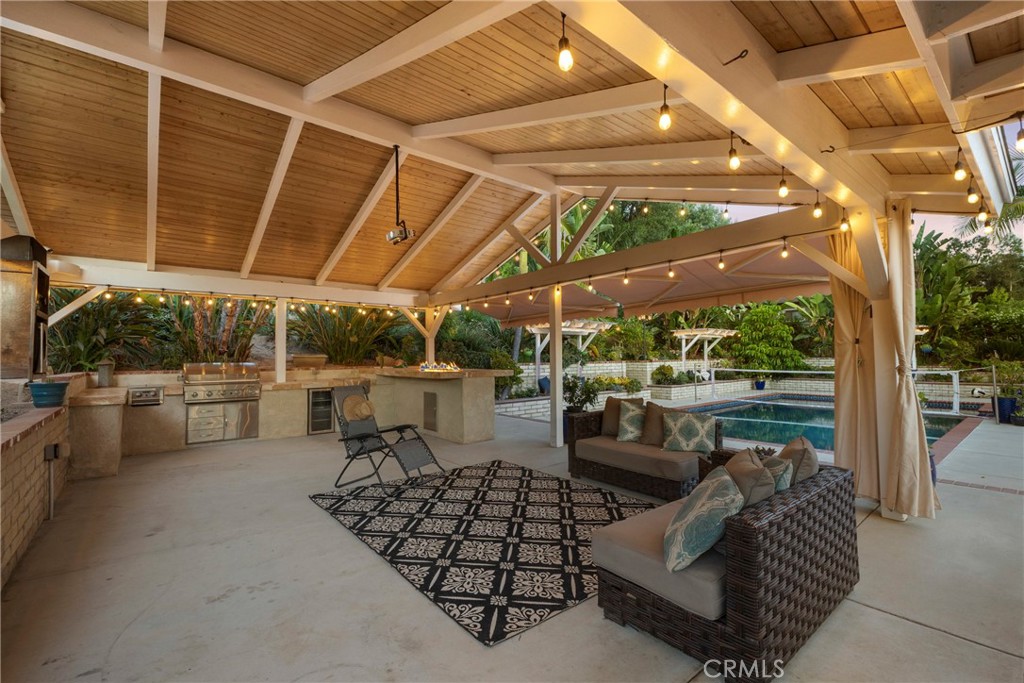 1446 Los Conejos Road Fallbrook, CA 92028 - Photo 38 of 66 a view of roof deck with table and chairs and potted plants