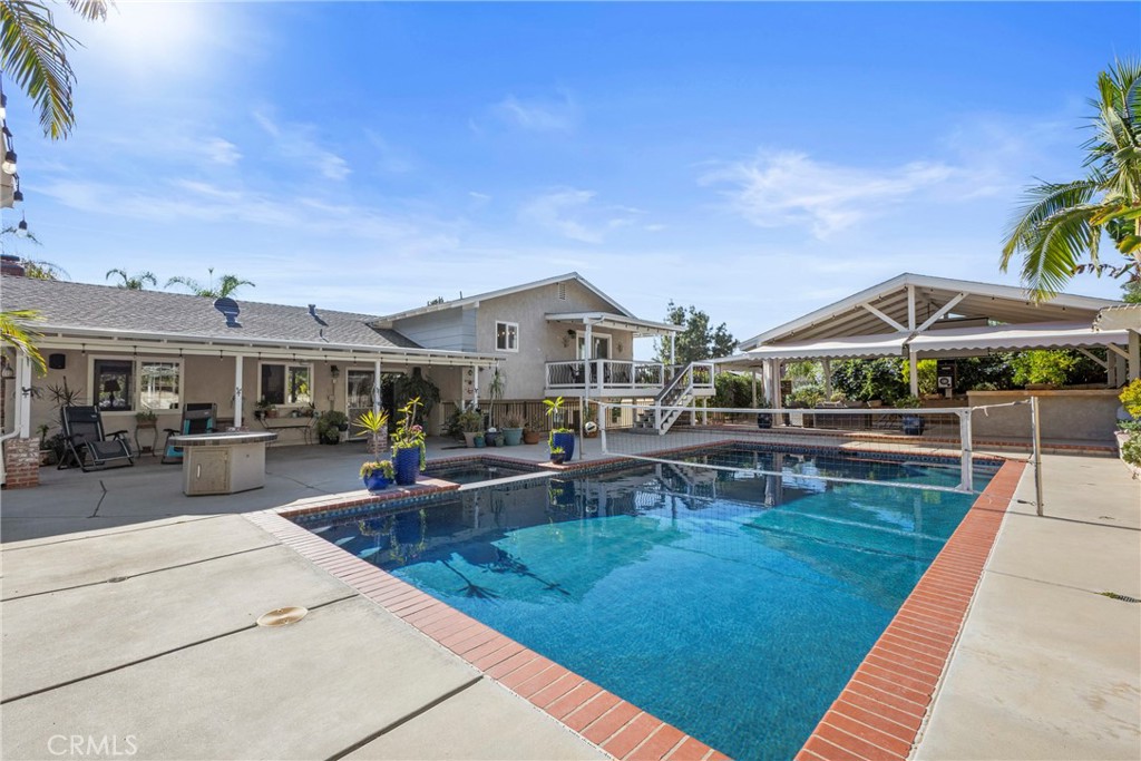 1446 Los Conejos Road Fallbrook, CA 92028 - Photo 50 of 66 a view of a house with swimming pool and sitting area